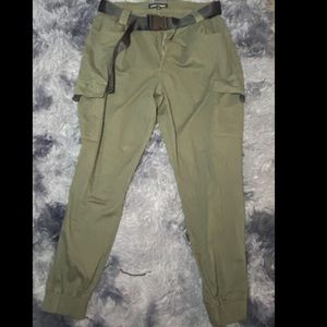 green joggers with strap belt